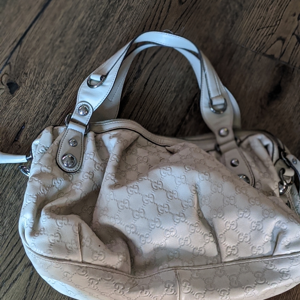 Cream colored Gucci bag